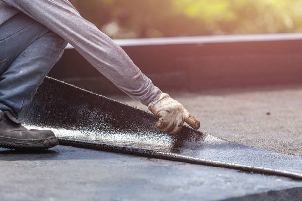 Professional Emergency Waterproofing technician working in Greenville, MI